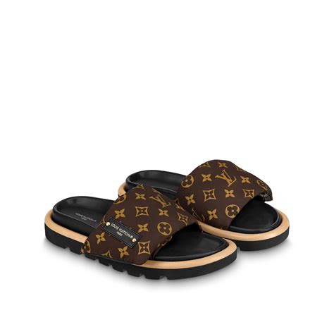 louis vuitton pool pillow slides.